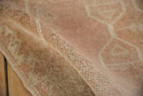 Even wear across the hand-knotted pile shows the knot heads of the vintage Oushak rug.