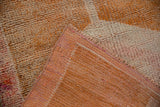 Hand-knotted distressed Kurd runner pile, striped flatweave back, and intact selvage.