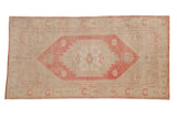 Vintage Distressed Oushak runner with faded dusty raspberry stepped medallion and ivory field, 3'2