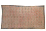 Vintage Distressed Sparta Carpet, faded blush field with allover clover motifs and denim border.