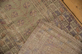 Distressed Oushak rug runner's tightly woven foundation and low-pile texture with muted colors.