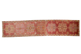 Distressed vintage Kurd runner rug, geometric quatrefoil medallions, abrashed field, 2'10