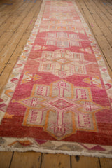 Vintage Distressed Kurd runner showing short, abrashed cochineal and ivory geometric pile.