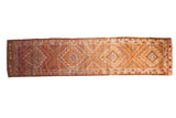 Distressed vintage Kurd runner, geometric medallions in dusty magenta, tangerine, ivory, coffee brown, 2'10