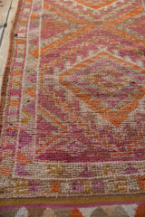 Geometric design and worn pile showing foundation on a vintage distressed Kurd runner.