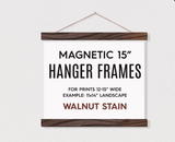 15 inch magnetic wooden hanger frame with dark walnut finish and hanging string.