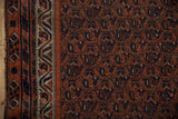 Antique Afshar rug side border features ivory geometric pattern and madder red, navy blue botehs.