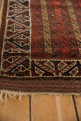 Wide main border and reciprocating wave motif on a fine antique Belouch rug's plain weave end.