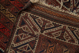 Nuanced plain weave end of an antique Belouch rug showing a detailed reciprocating wave design.