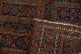 Pawn design motifs and hand-knotted reverse of a vintage Belouch rug's folded corner.
