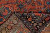 Vintage Lilihan Persian rug fold showing detailed dark blue and brick red pile, woven foundation.