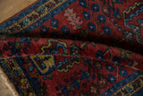 Fine Lilihan rug's plush cherry red pile, sapphire blue, and scarce yellow border.