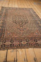 Farahan Sarouk border of oversized floral cross-sections and lattice botehs, blush, navy.