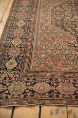 Antique Farahan Sarouk rug's classic main border with floral cross-sections and vinery in blush, sage, navy.