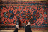Vintage Mehriban hand knotted runner, dusty pink field, teal palmettes, and patterned border, underfoot.