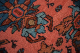 Hand-knotted vintage Mehriban rug detail: dusty pink, deep teal, and copper stylized palmettes.