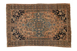 Antique Persian Farahan Sarouk rug, shield medallion, dusty blush, navy floral blossoms.