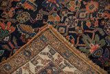 Kurdish Bijar rug: cobalt blue, madder red floral pattern, hand-knotted texture, visible woven reverse.