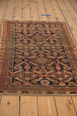 Antique Belouch rug pile with sharp serrated geometric Herati motif, navy, rust, brown.