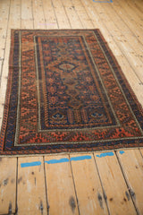 Antique Belouch rug corner detail, serrated leaf and reciprocating wave borders.