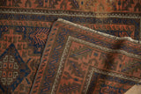 Folded Antique Belouch rug detail, geometric field patterns and serrated main border.
