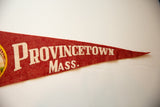 Vintage red felt pennant detail featuring cream 'PROVINCETOWN Mass.' text and pointed tip.
