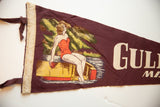 Close-up of the vintage bather graphic and cream felt edge on the Gulfport pennant.