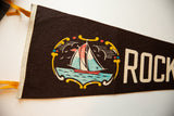 Cream stitched border and yellow felt ties on the vintage Rockland Maine flag.