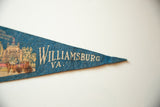 Aged blue felt texture and lettering on the tip of the vintage Williamsburg VA pennant.