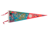 Vintage Expo 67 Montreal felt flag with vibrant retro graphics in teal and red.