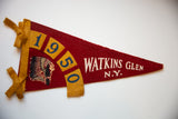 Vintage Watkins Glen pennant in red felt with a chief graphic and yellow 1950 date.