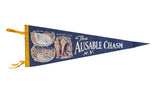 Vintage Ausable Chasm NY felt flag in blue with a yellow border and scenic landmark graphics.