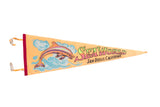Peachy orange vintage Sea World felt flag pennant featuring a jumping dolphin, 9x26 inches.