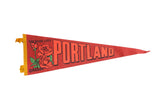 Vintage red felt Portland Oregon pennant flag, rose graphic and yellow trim, 9x26 inches.