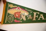 Green felt 'Souvenir of the Fair' pennant, cow, horse, Ferris wheel, yellow binding.