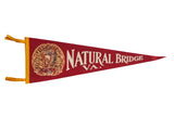 Vintage Natural Bridge VA felt pennant flag, red and yellow, with central bridge graphic.