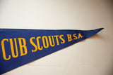 Blue felt pennant tip with yellow BSA lettering, showing vintage texture.