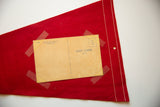Vintage red felt flag reverse side, with taped postcard, white stitching, and hanging hole.