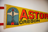 Vintage Astoria Oregon felt pennant, featuring Astoria Column graphic and red tie.