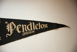 Black felt pennant detail showing beige 