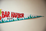 Tapered end of felt pennant with red 'HARBOR MAINE' text and blue flames.