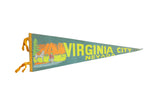 Vintage Virginia City Nevada felt pennant, teal with yellow text and retro landscape.