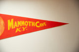 Pointed tip of red felt Mammoth Cave KY pennant with bright yellow text.