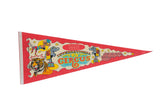 Vintage Tarzan Zerbini Circus felt flag, red with bright retro graphics, 12x29 inches.