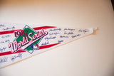White felt pennant showcasing 1987 World Series text and multiple printed player signatures.