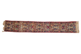 Antique Kerman mat runner; blossom floral design in cochineal red, navy, apricot. 1'2