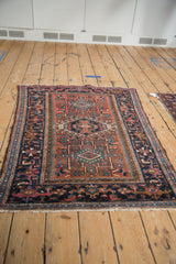 Vintage Karaja rug corner, geometric Samovar border, navy blue, dusty teal, madder red.