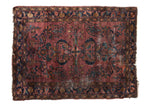Vintage Lilihan rug runner, plum abrashed field, central floral and scrolled boteh motifs.