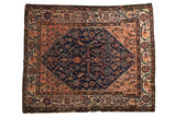 Vintage Malayer rug with deep indigo medallion, figural blush field, and unique patterned borders.