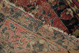 Vintage Lilihan rug foundation displaying knot heads, beige weft, and faded brick red pile.